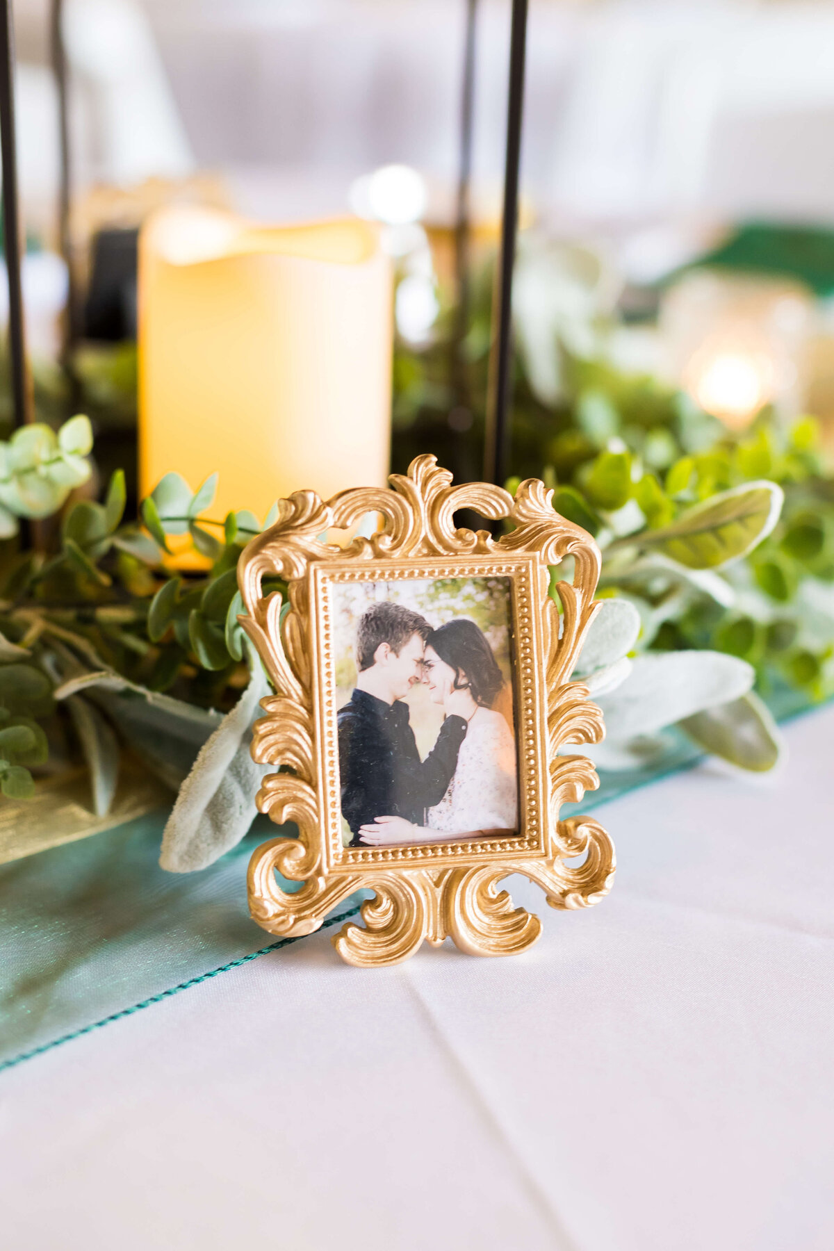 Photo on table of bride and groom in a frame