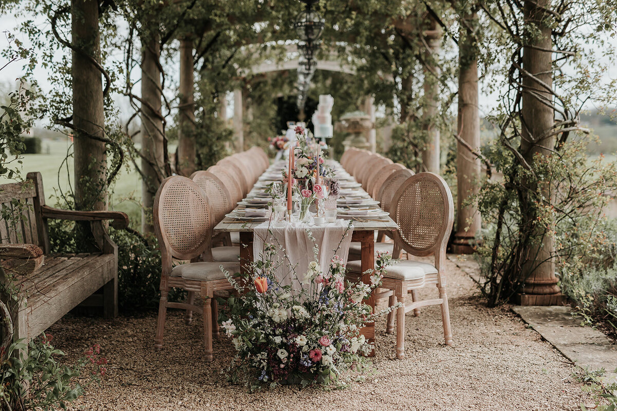 Beautiful fairytale long table set up for a romantic wedding at Euridge Manor