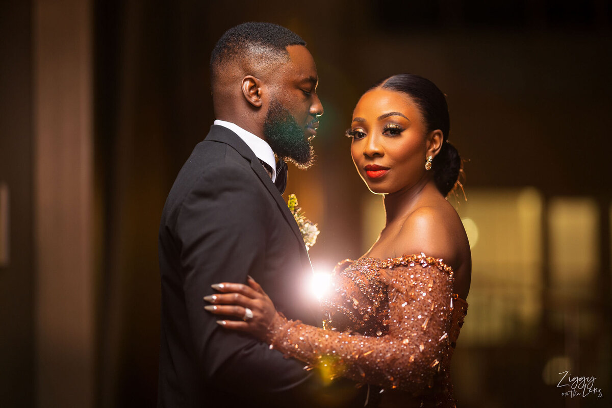 Tomi and Tolu Oruka Events Ziggy on the Lens photographer Wedding event planners Toronto planner African Nigerian Eyitayo Dada Dara Ayoola ottawa convention and event centre pocket flowers Navy blue groom suit ball gown black bride classy  82
