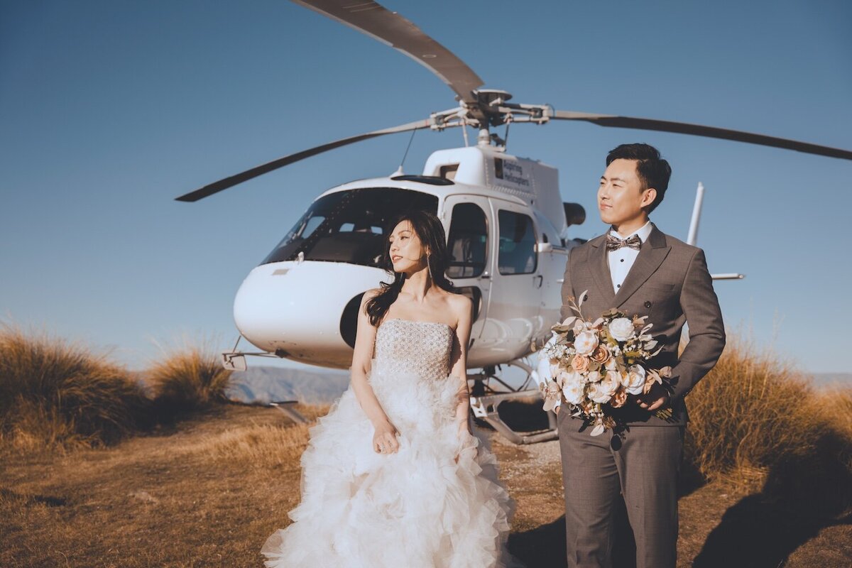 Autumn wedding shoot at Millbrook, Arrowtown. Vintage car & helicopter.