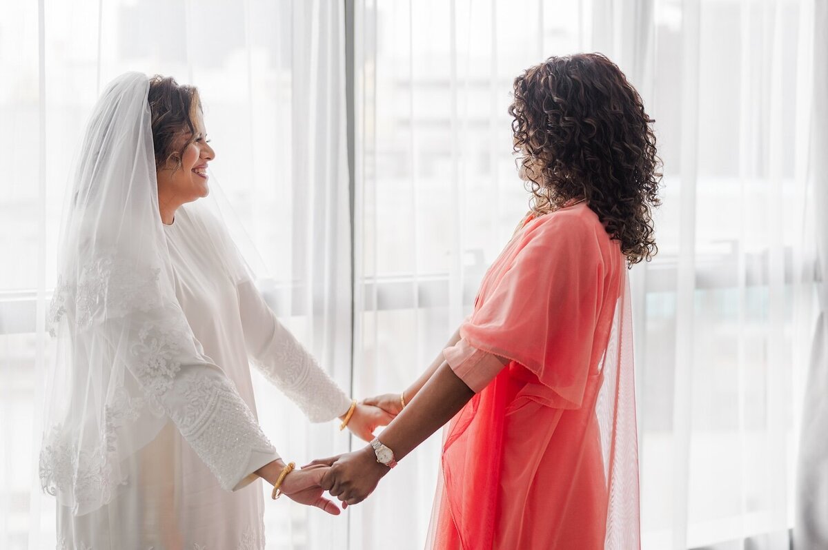 Bride and Best Friend sharing a first look