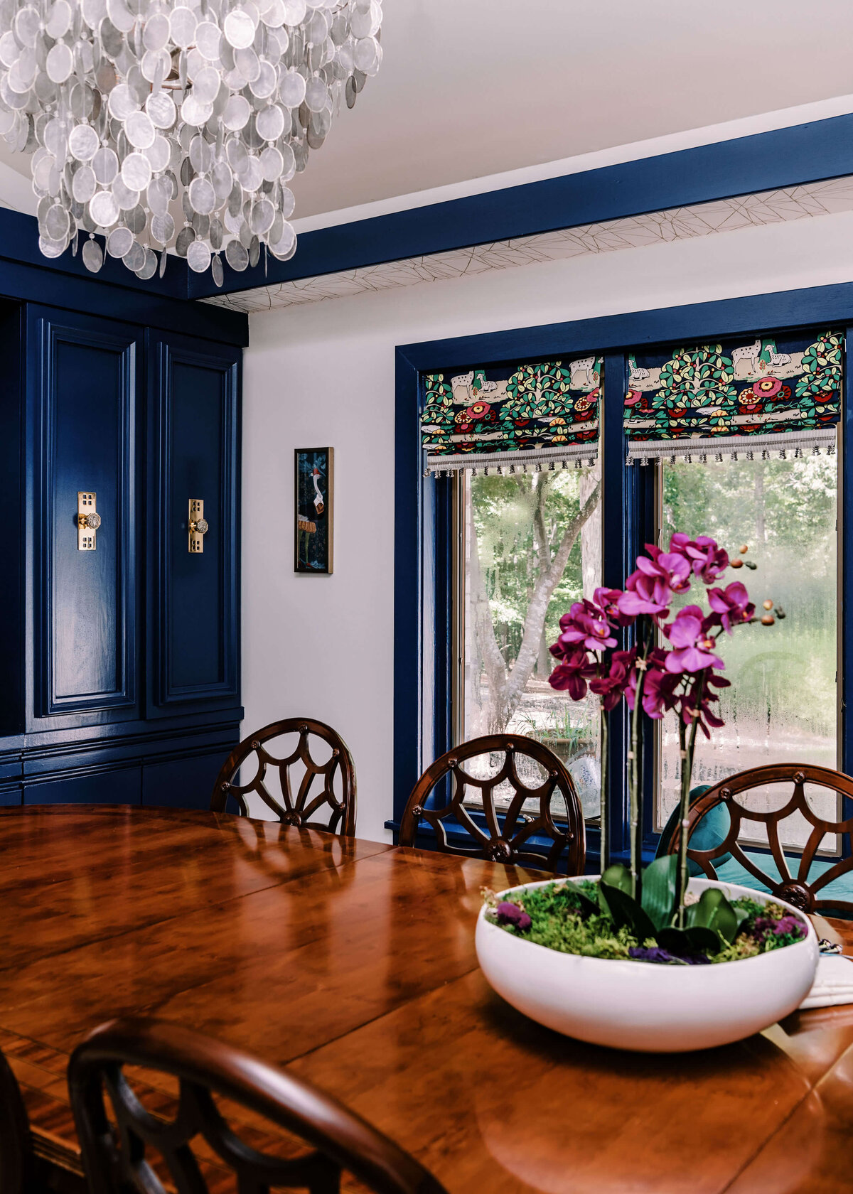 sweet southern home merry maximalism bright blue cabinets wooden dining room table