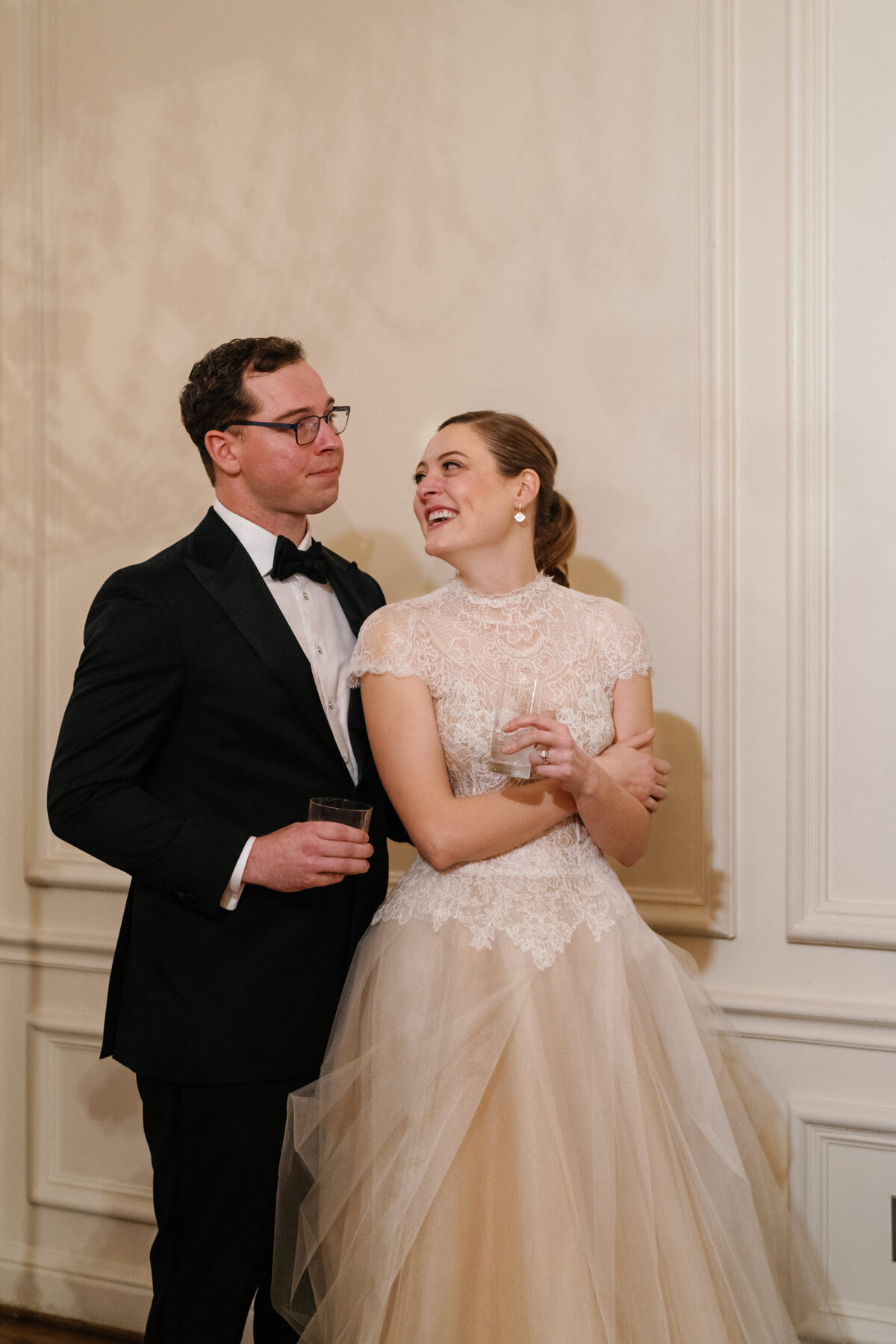 Bride and groom toasts at their wedding reception