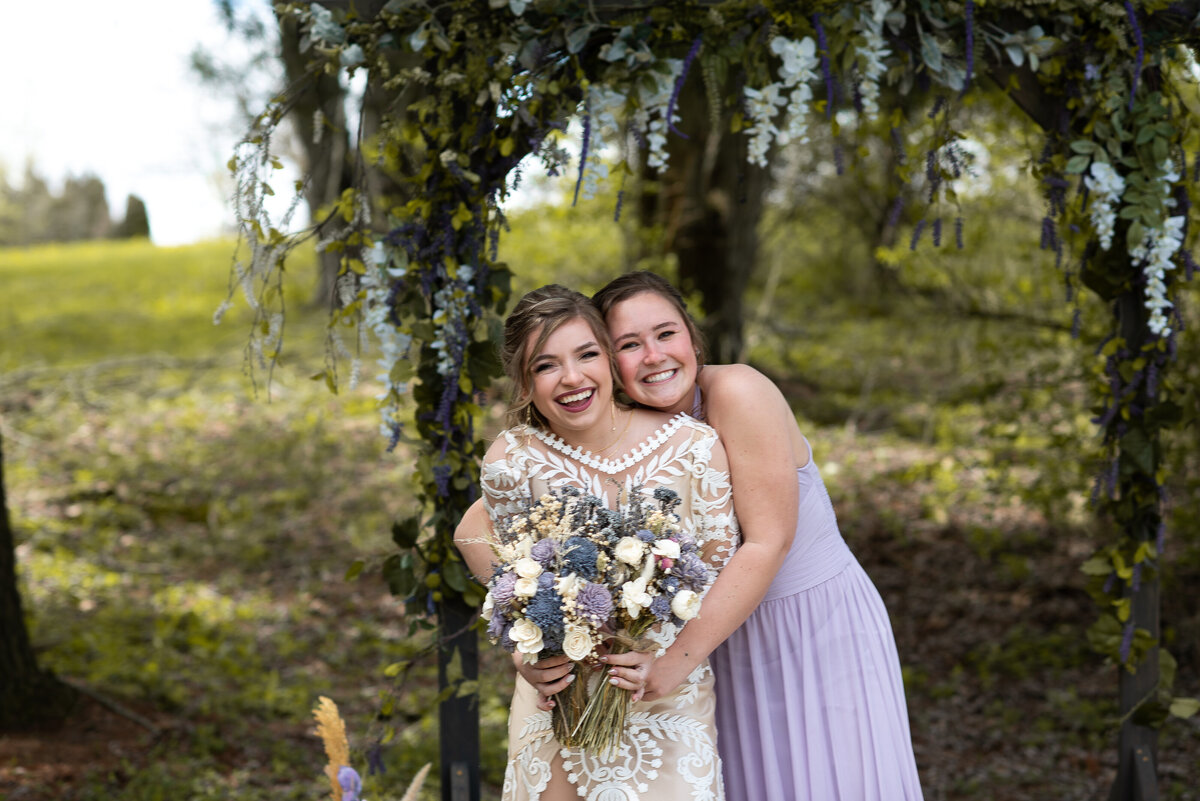 Candid kiss between wedding couple