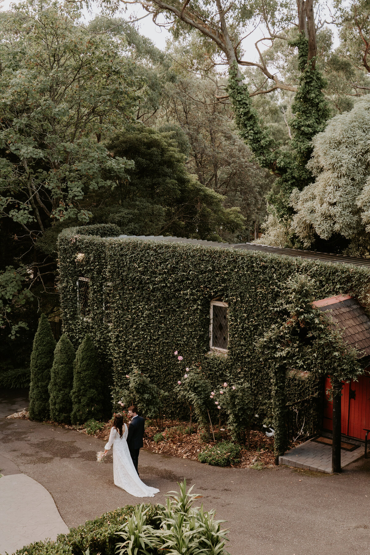 Bride and groom walking at Avalon Castle