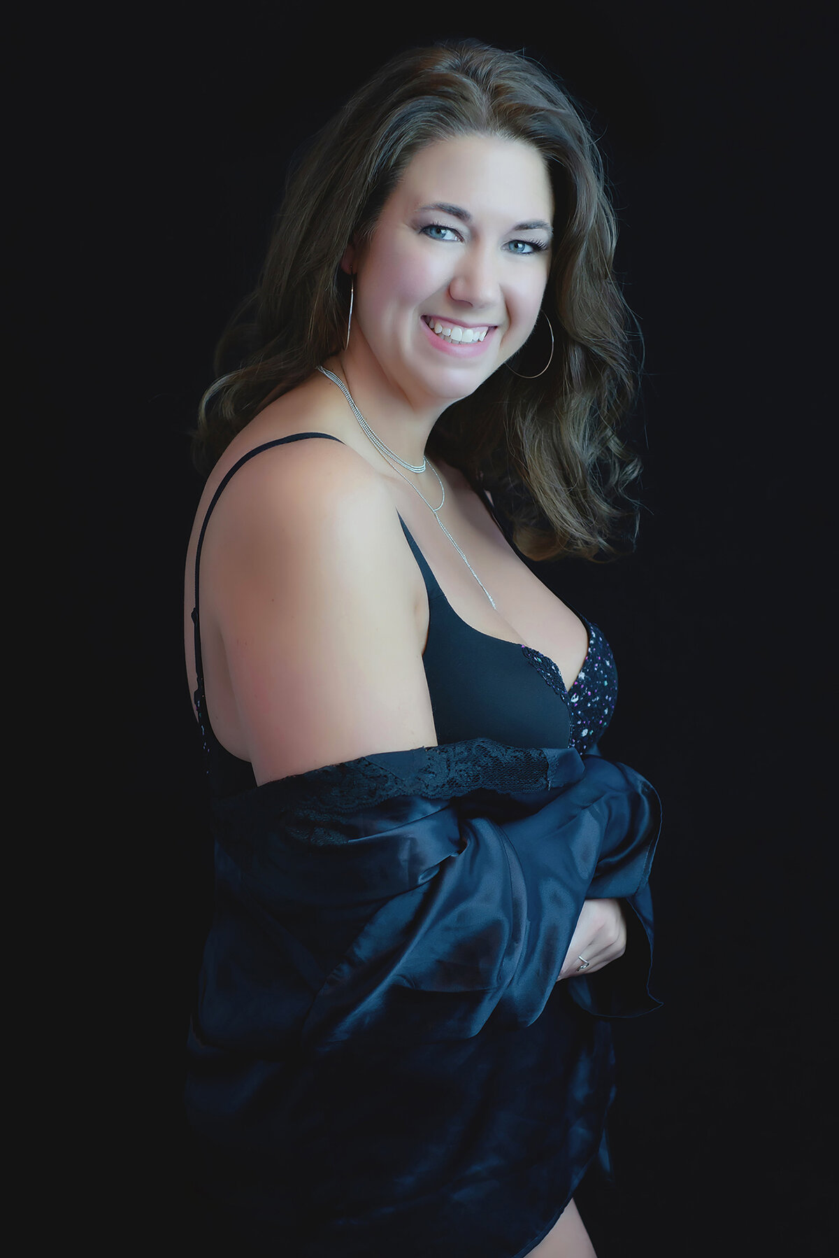 Woman in Lingerie posing for a boudoir photoshoot