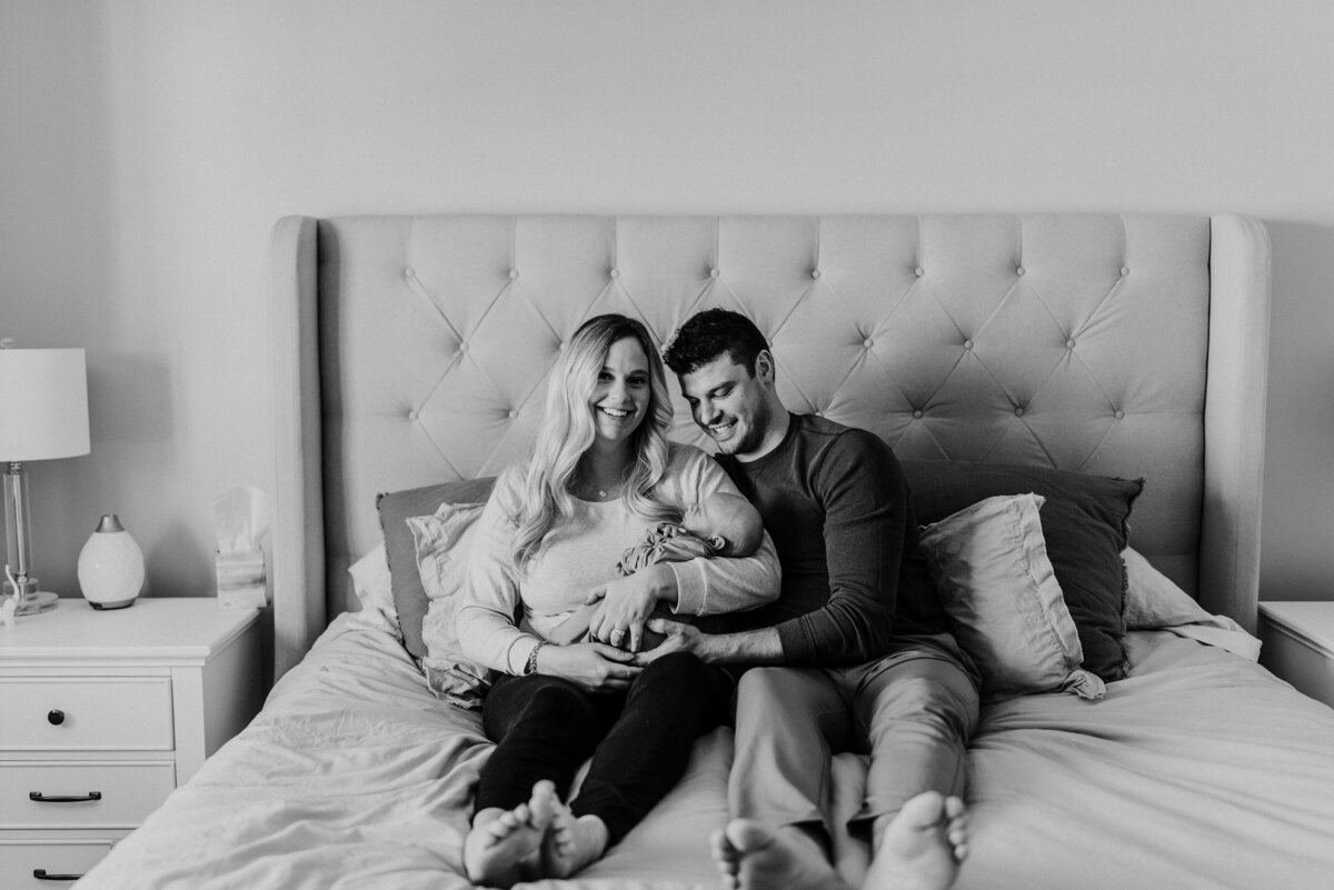 Embark on sweet beginnings with cozy newborn portraits in Minneapolis. Shannon Kathleen Photography transforms your home into a haven for capturing the magic of your newborn.