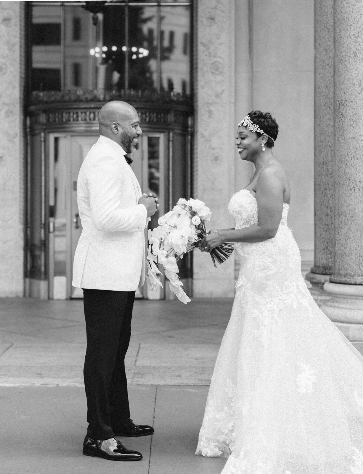 couple first look with beautiful Detroit architecture