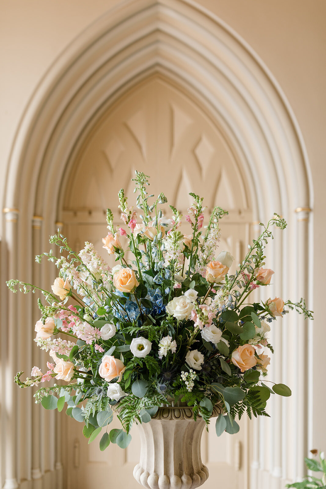 wedding floral arrangement at church