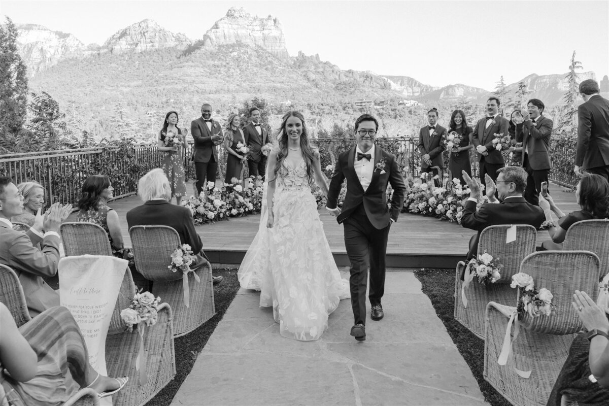 sedona-wedding-couple-walking-down-aisle