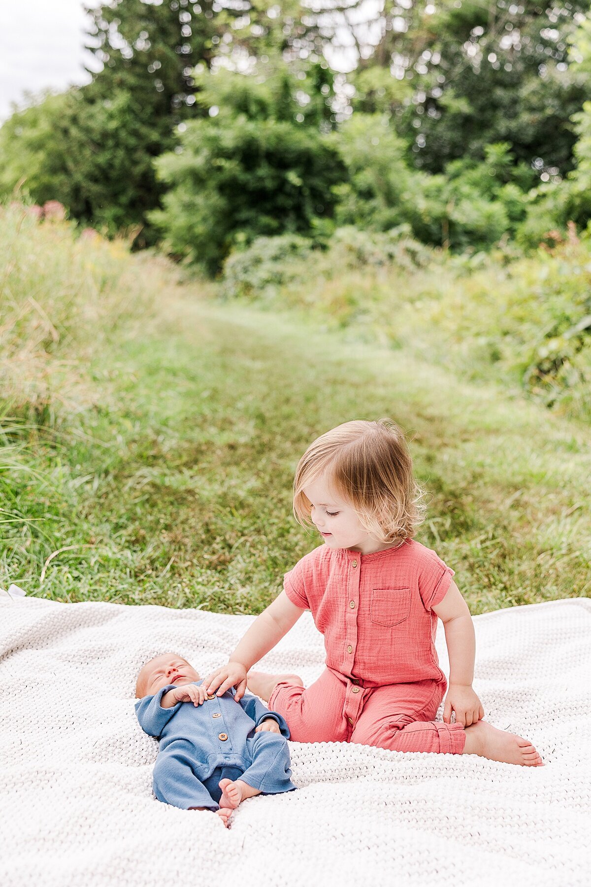 Outside  Newborn Photo Session with Sara Sniderman Photography  at Heard Farm Conservation Land, Wayland Massachusetts