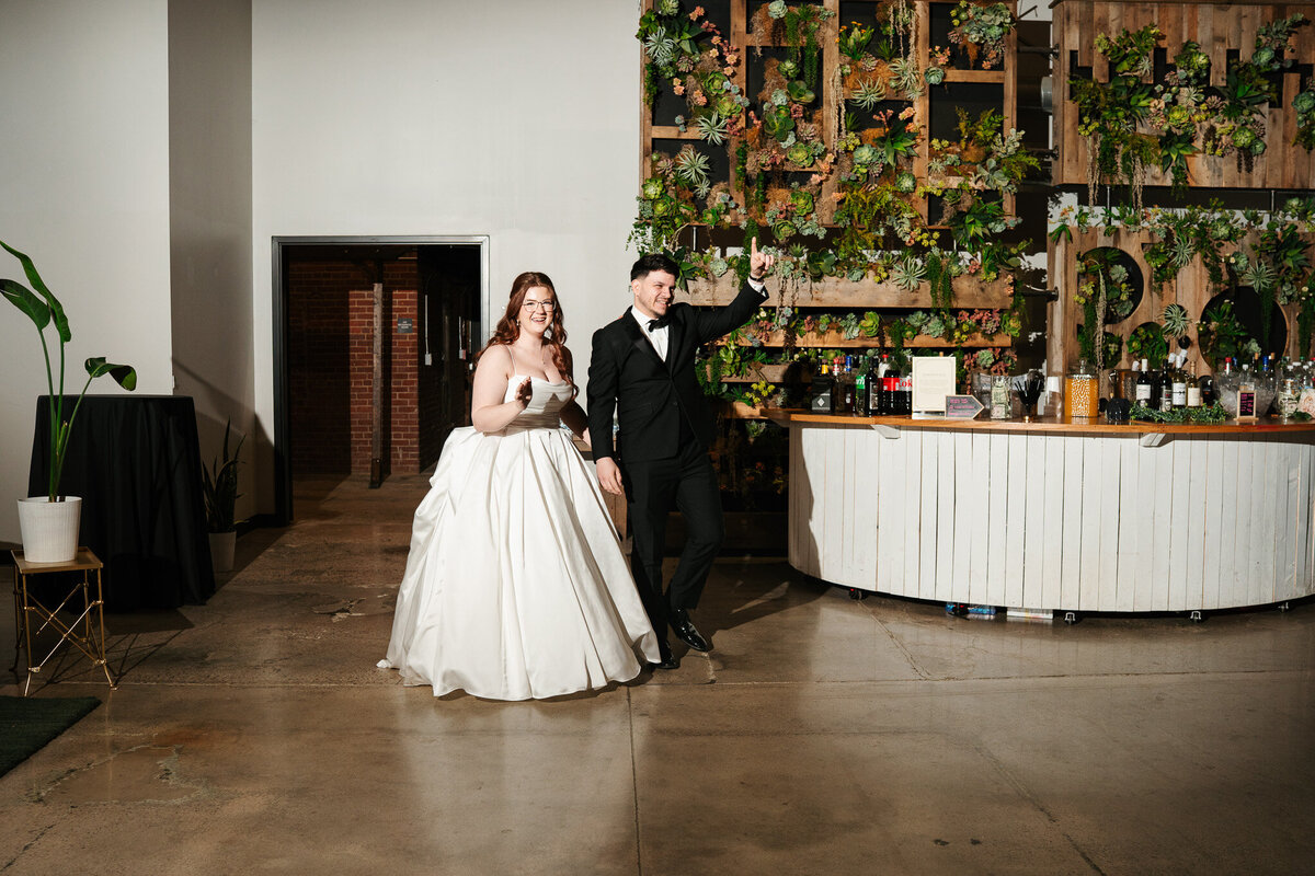 Industrial wedding photos at The Venues at the Factory featuring emotional portraits and unique architecture