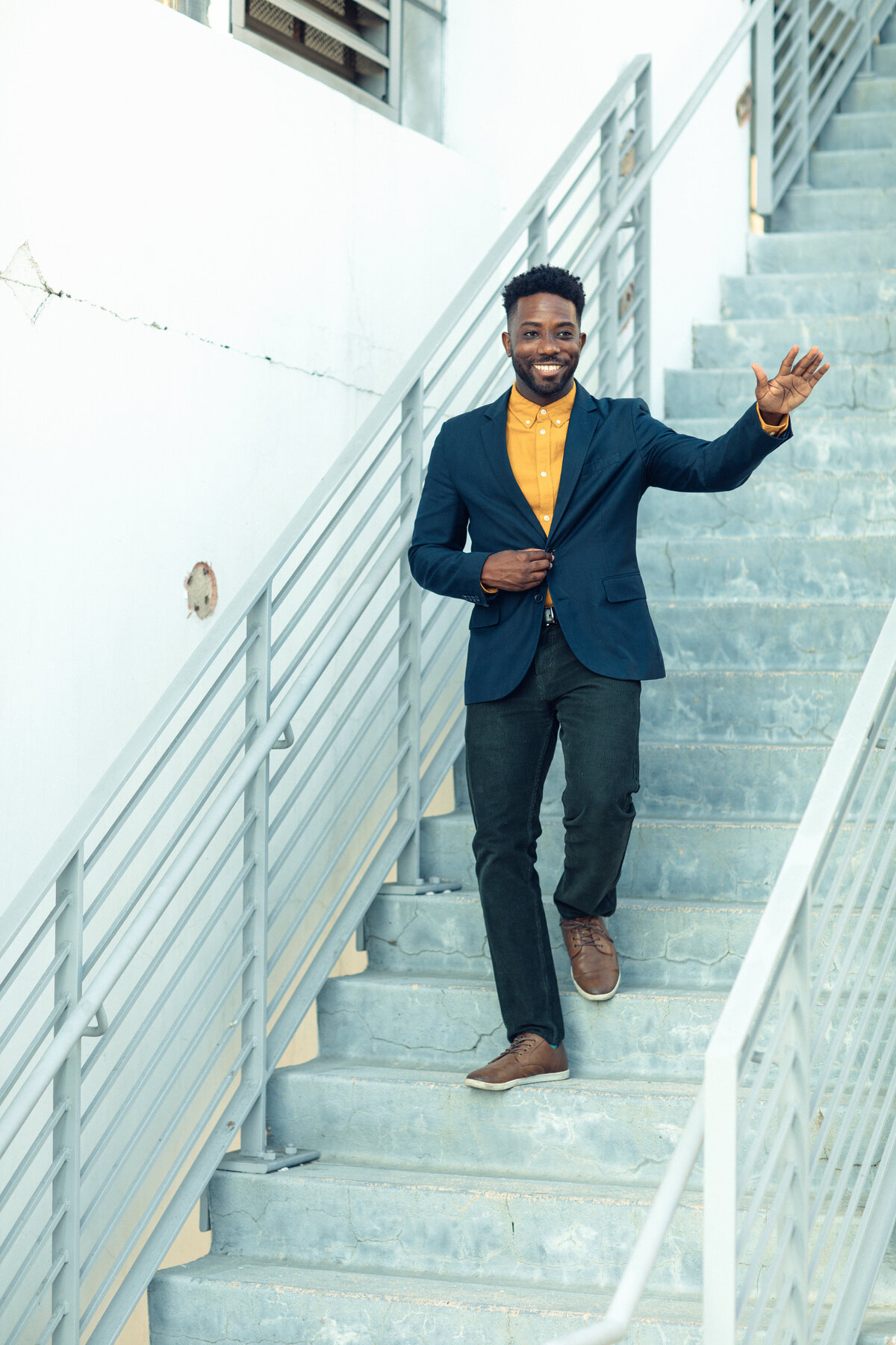 Portrait Photo Of Young Black Man Walking Down The Stairs Los Angeles