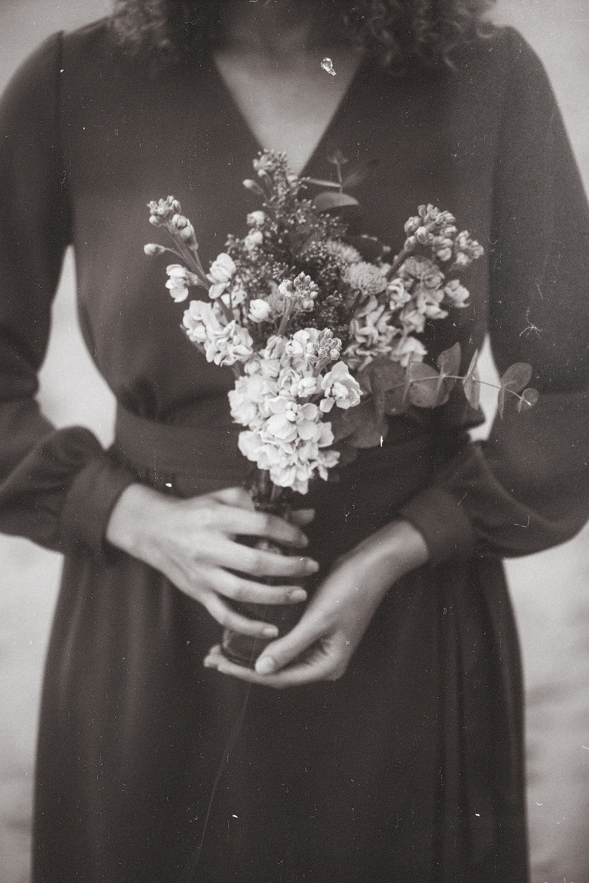 Portrait Photo Of Young Black Woman Holding Flowers Los Angeles