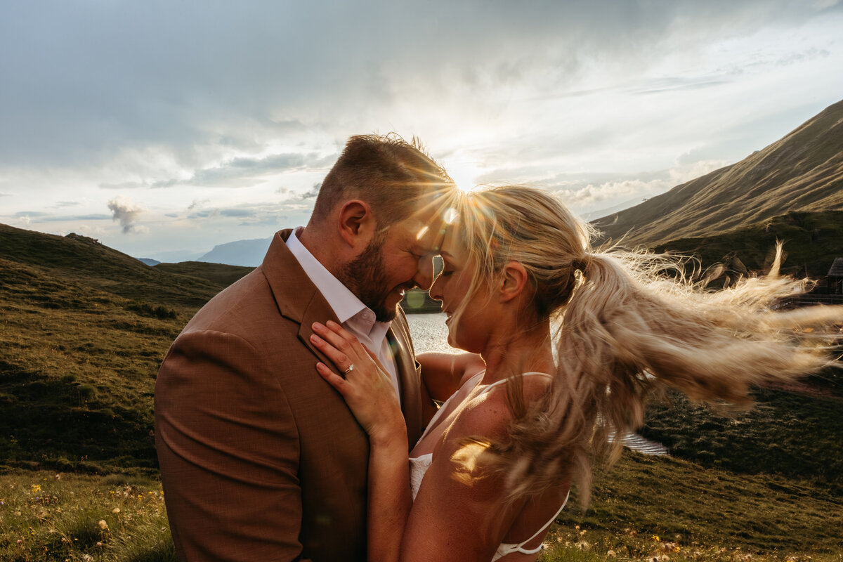 Close embrace during Dolomites elopement at golden hour