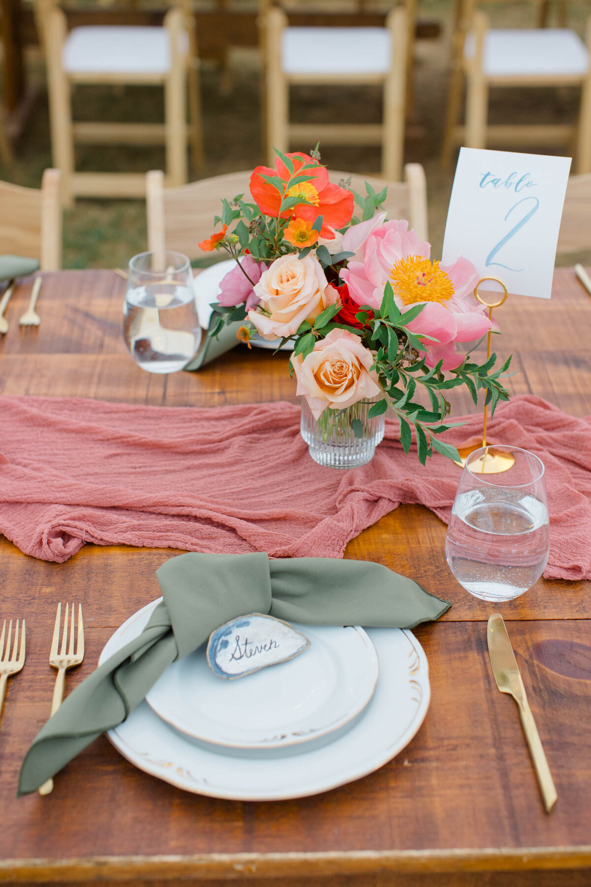 Tablescape with pink runner at Maine wedding