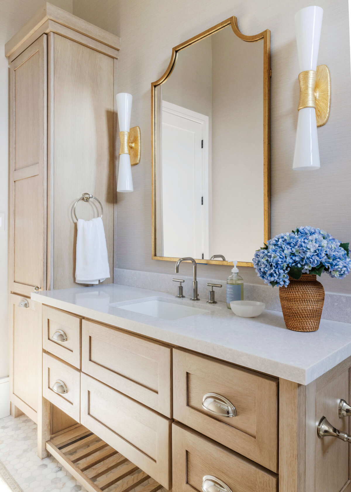 oyster creek studios hughes wooden vanity with gold hardware in bathroom
