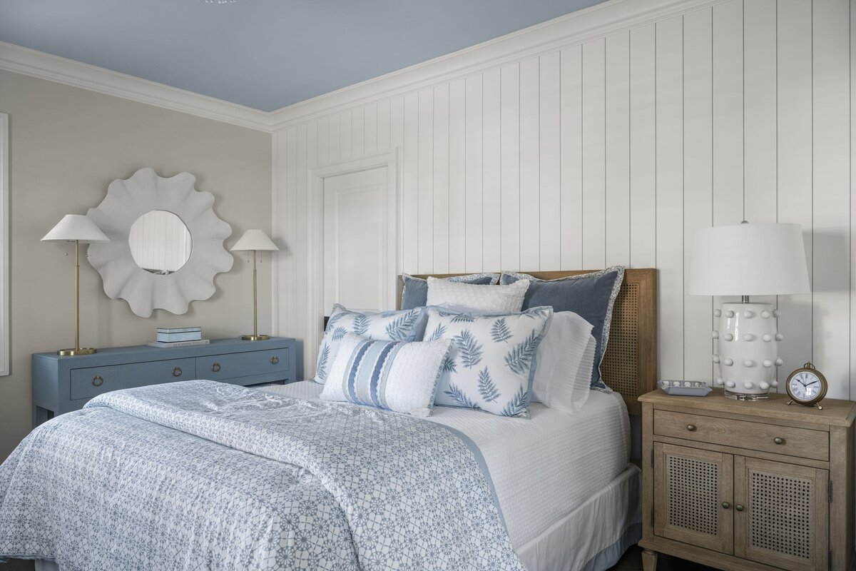 candra lynn interiors ocean port project bethroom with blue and white bedding
