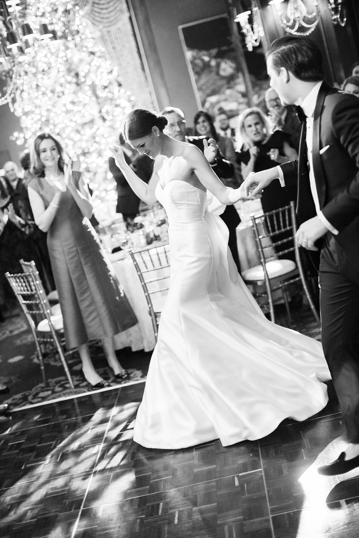 bride and groom walk into reception at the Union League Club of Chicago