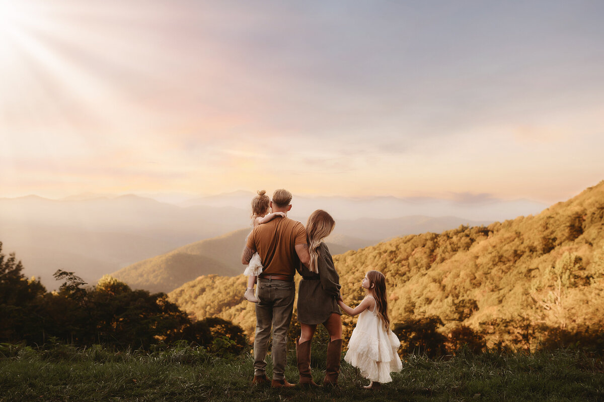 Family enjoys the view during their Family Photoshoot on the Blue Ridge Parkway in Asheville.