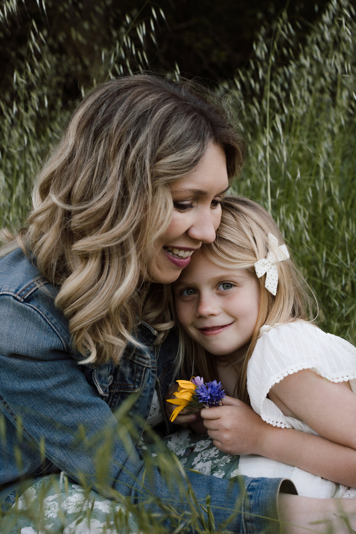 A mom and daughter embrace at Helen Putnam regional park