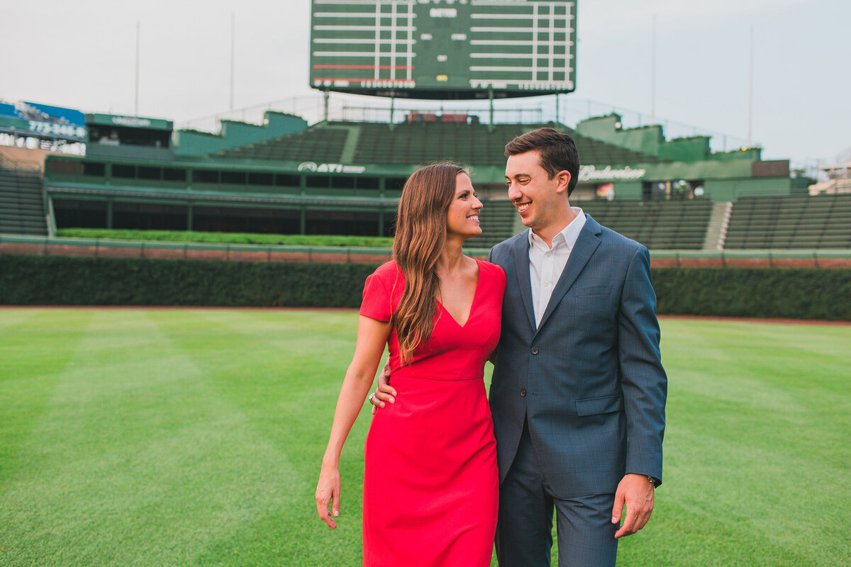A classy engagement photo taken on Wrigley Field