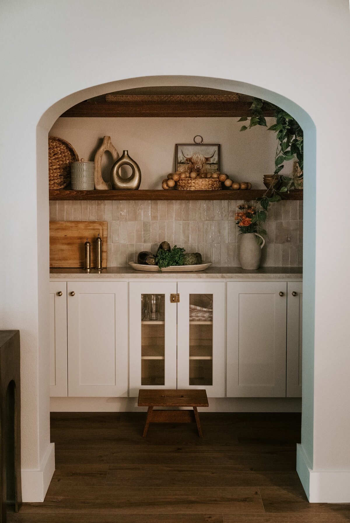 dewine design orlando interior design vintage cove trail arched door and wood floors