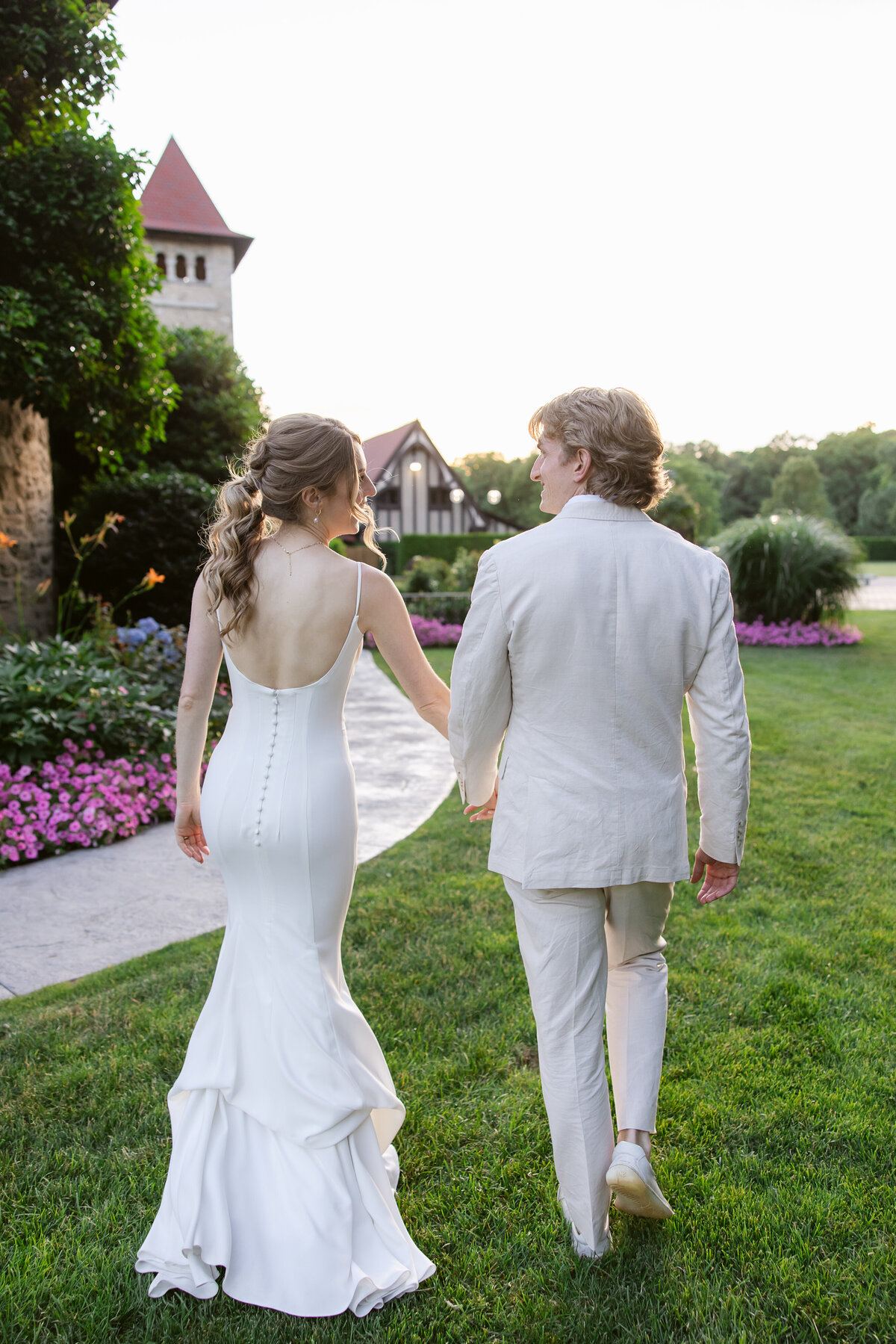bride-and-groom-sunset-stroll-at-saint-clements-castle