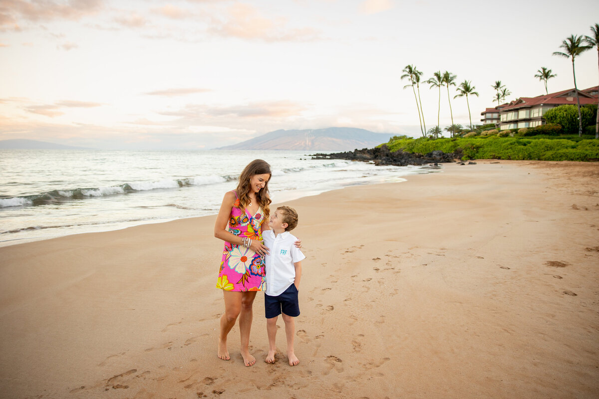 Maui Family Photographers capture mother playing with son on beach
