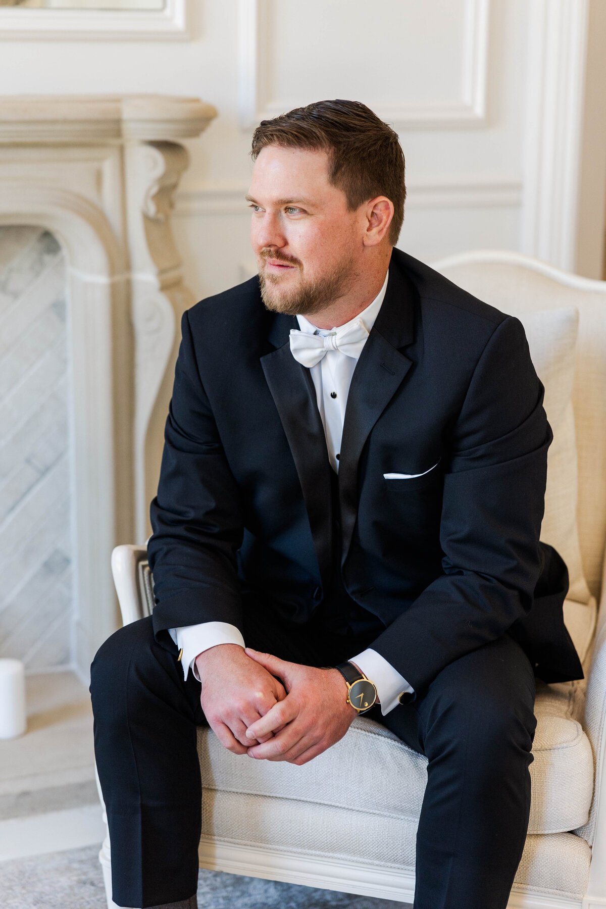groom-portrait-sitting-in-chair