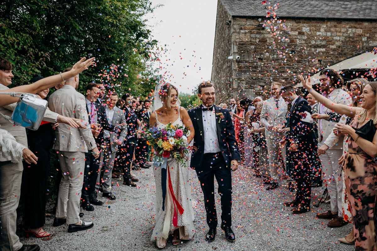 Colourful confetti shot with all guests at The Outbarn