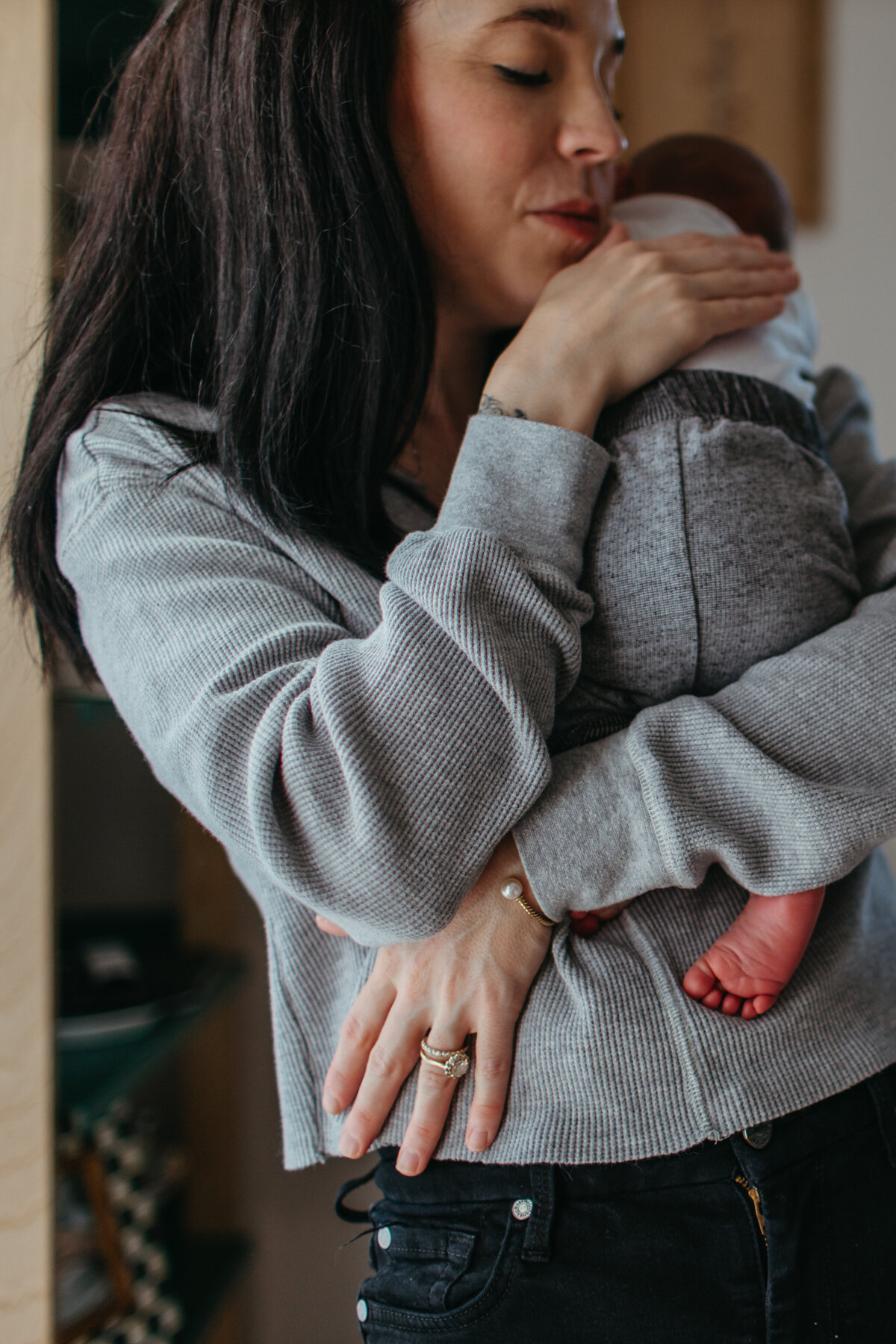 holding_newborn