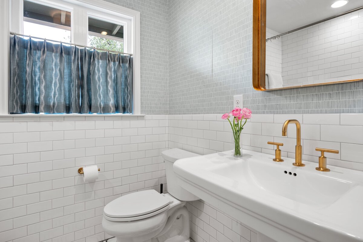 the keeping room interiors oakview guest bathroom with dark blue window curtains