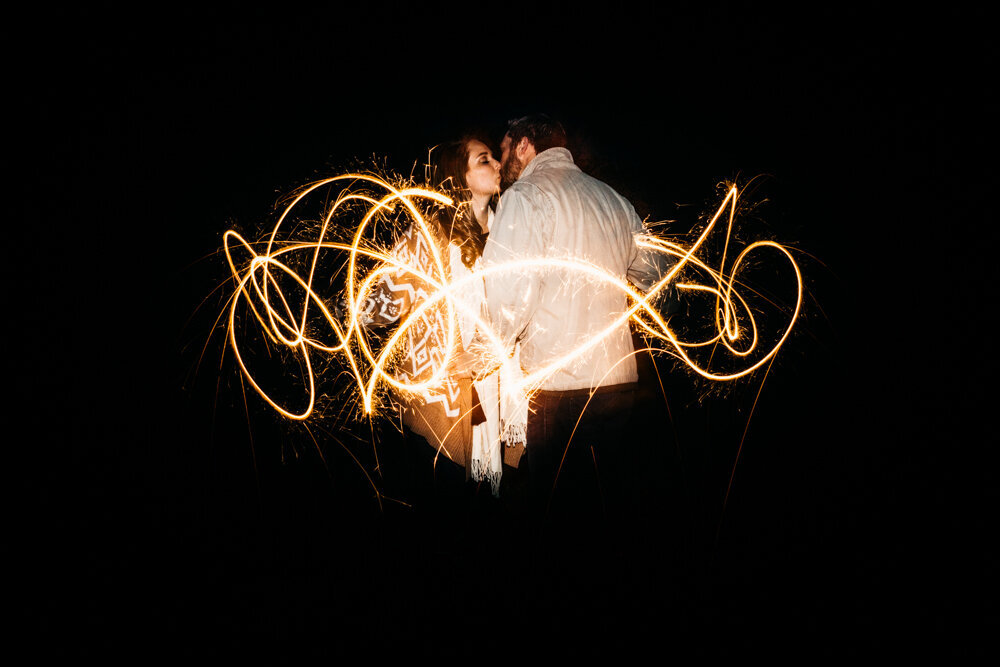 Couple Surrounded in Fireworks