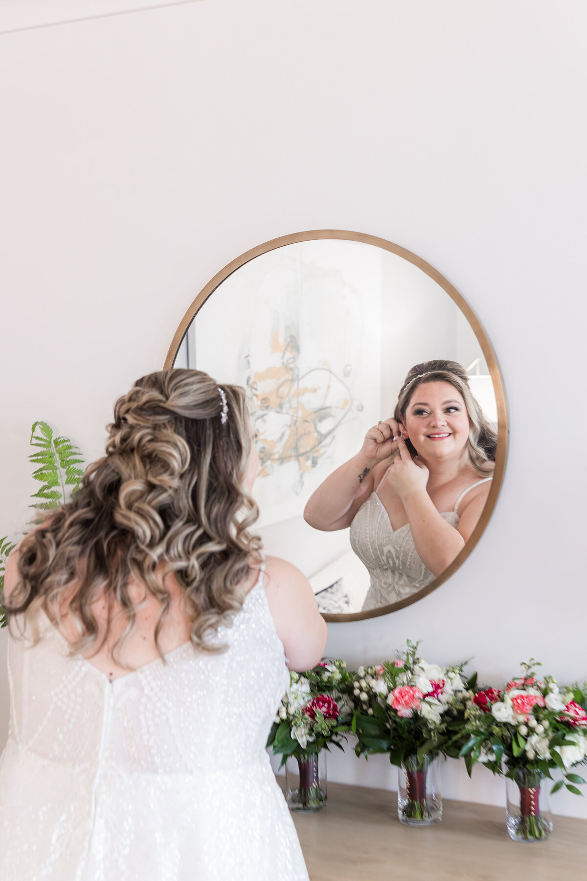bride-getting-ready-in-mirror
