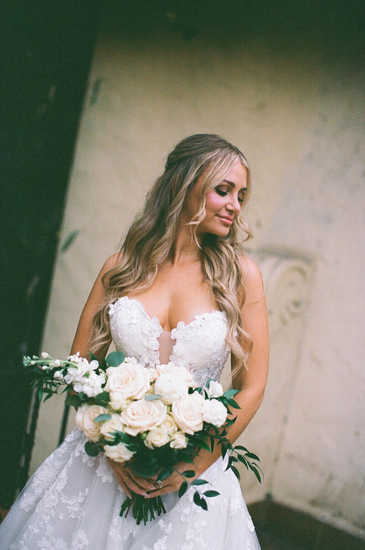 Bride holding bouquet, taken by one of the best wedding photographers in orlando fl