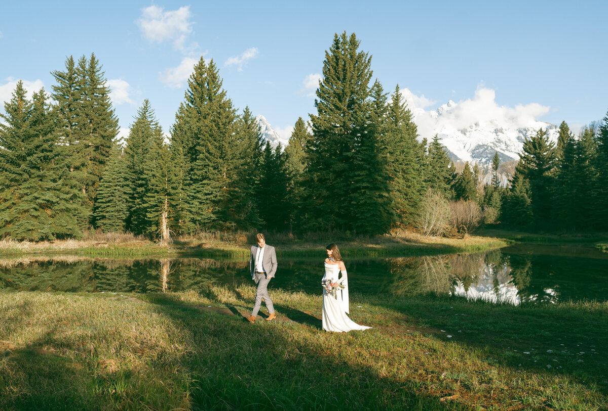 elopement photographer in grand teton national park, bride and groom hiking