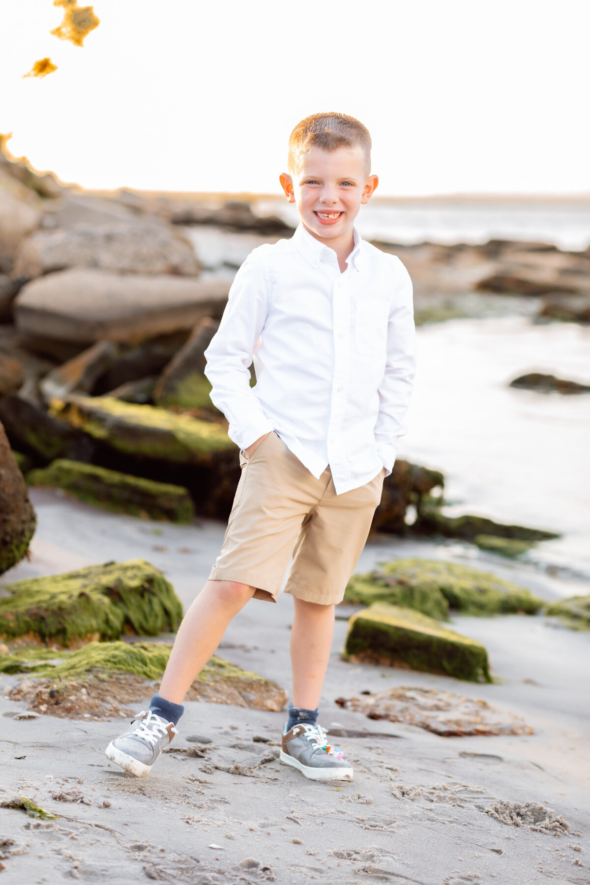 Boy-Standing-Water Jetty-Beach