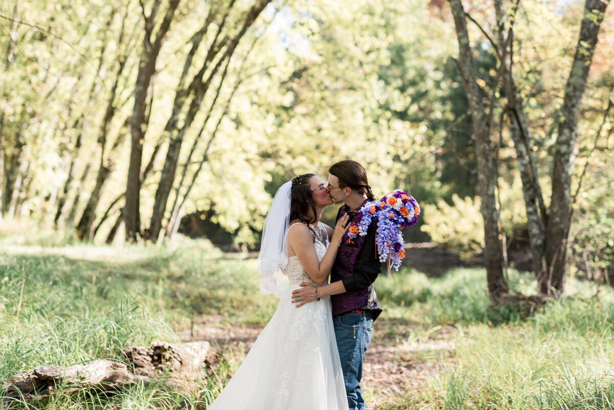 Floral wedding arch details in sunlight