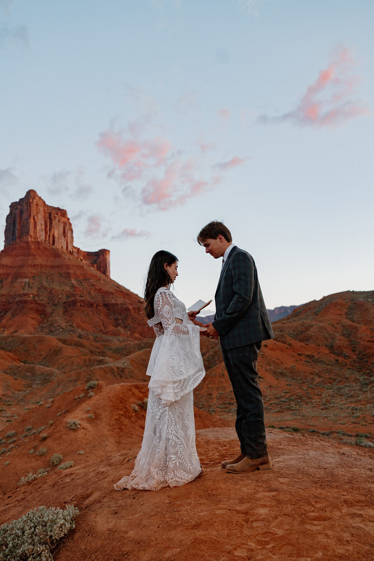A bride read her vows to her groom on their elopement day in Utah