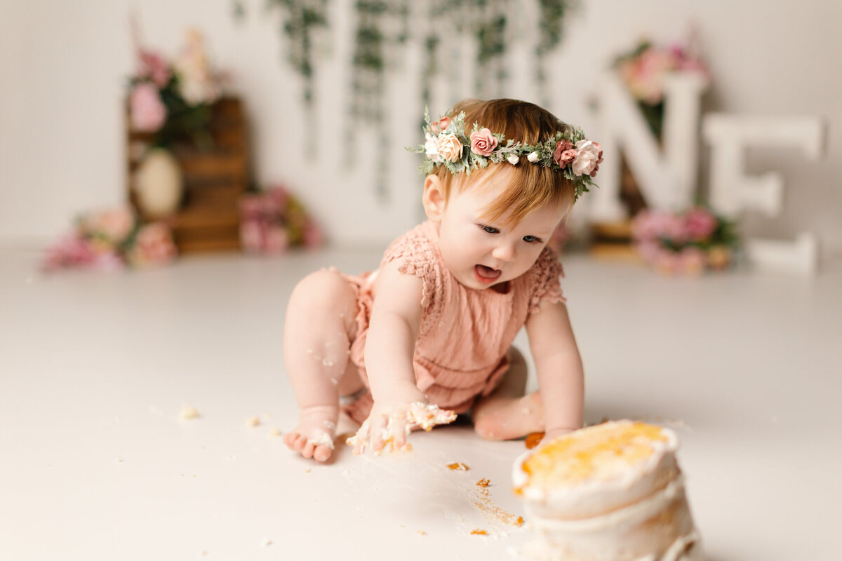 NWA cake smash photographer, milestone portrait session, baby birthday photoshoot Northwest Arkansas, best cake smash photography near me Fayetteville AR