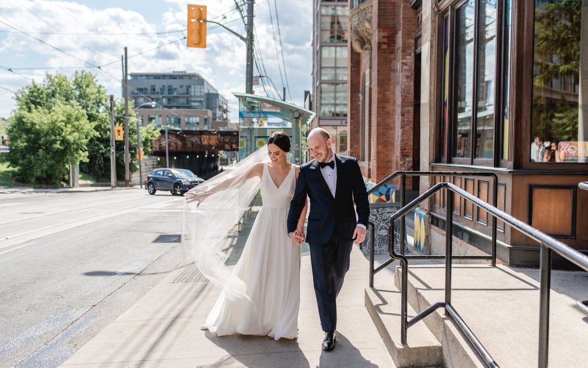 Gladstone Hotel Downtown Toronto Bride and Groom Portraits Walking on Queen Street Fun Happy Couple | Jacqueline James Photography Toronto Wedding Photographer for modern, wild romantics