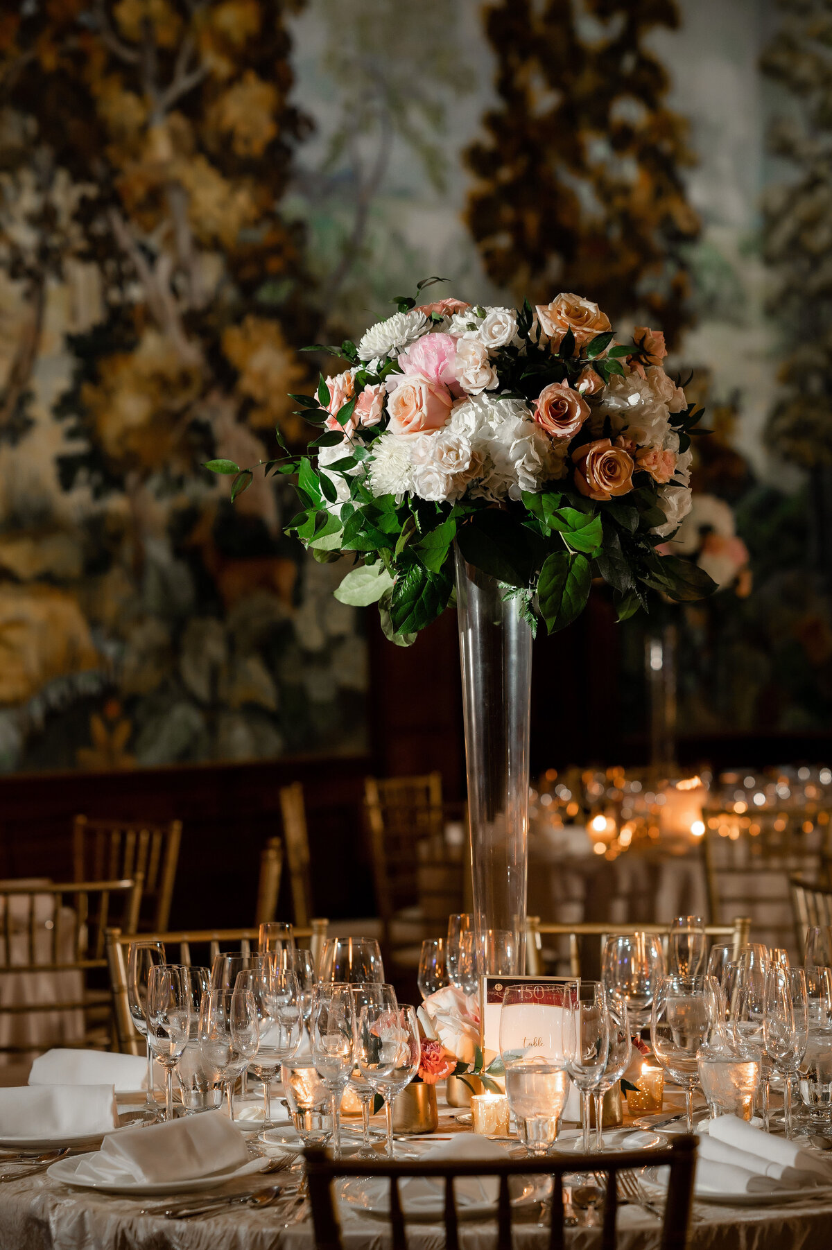 photo of high centerpiece with flowers in the ballroom at duquesne club