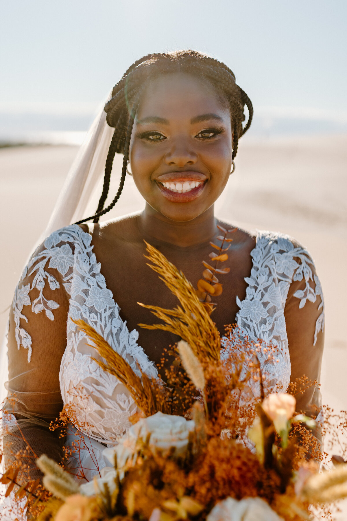 bridal portrait of woman in the sand dunes