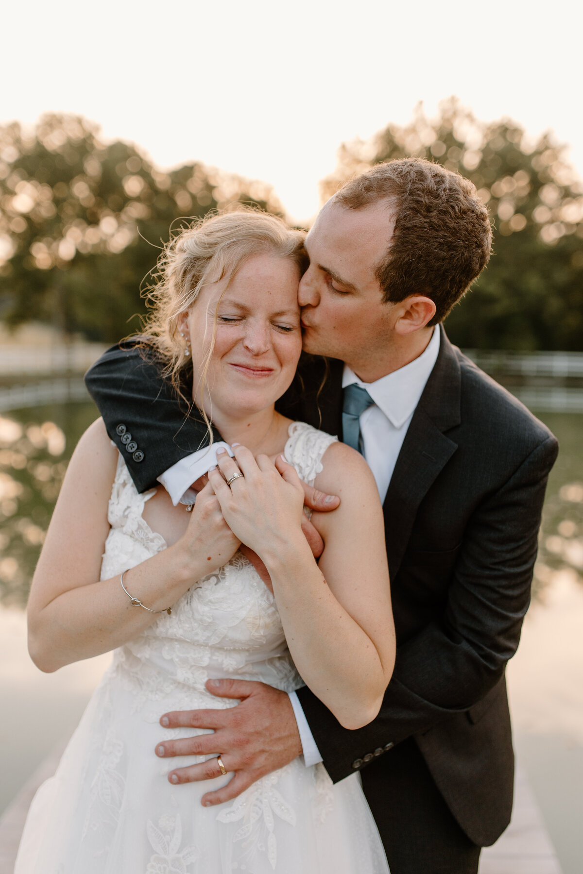 bride and groom pond photos