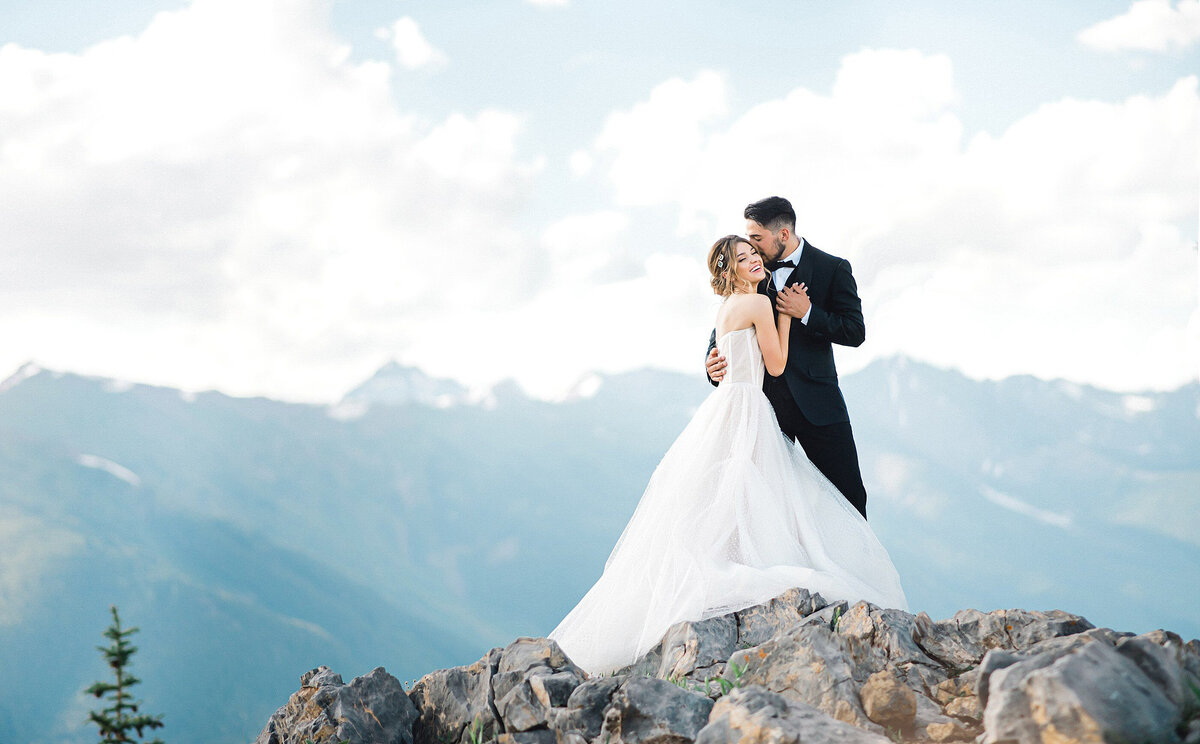Couple getting married in Colorado on top of a mountain