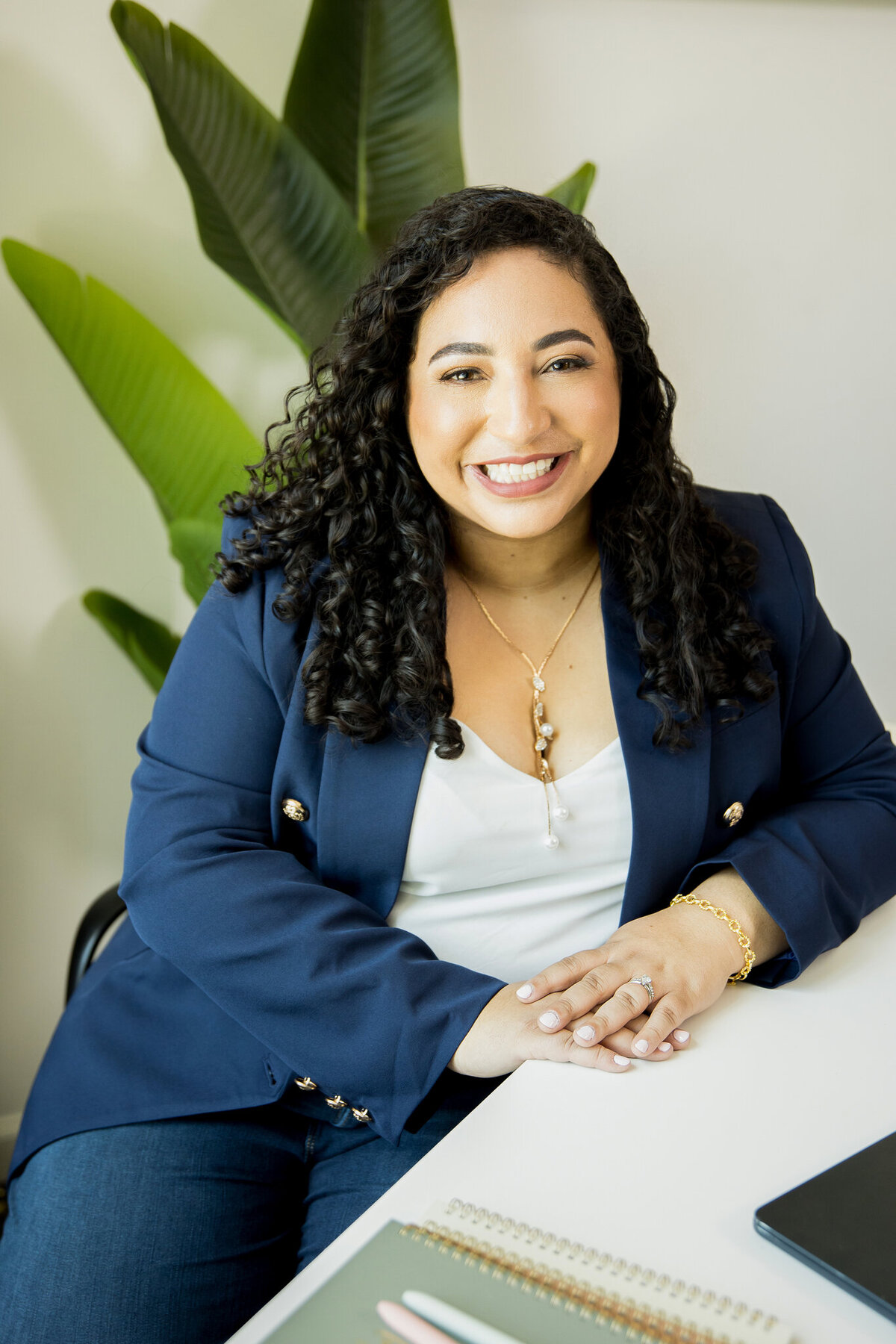 Heather smiling warmly while sitting perfect for personal branding and lifestyle content.