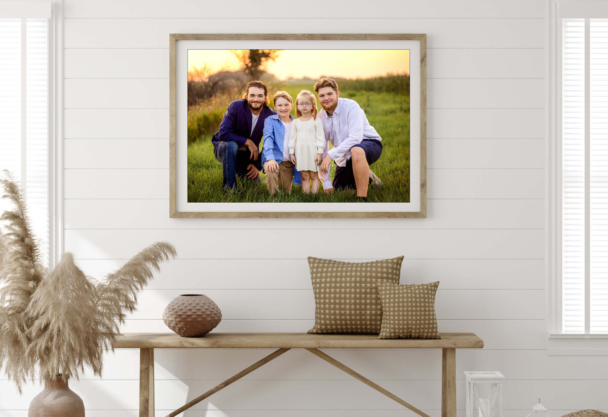 Family portrait displayed in a frame.