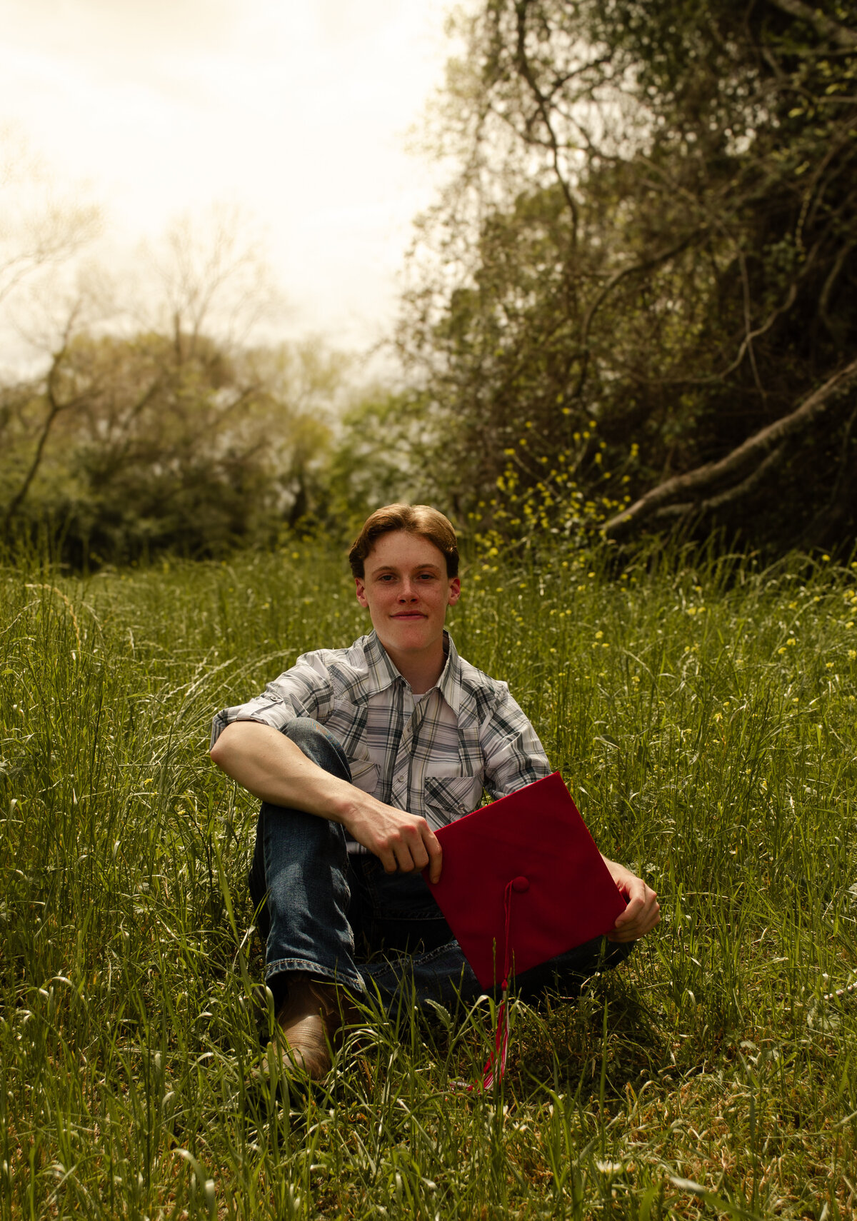 senior boy sitting pose