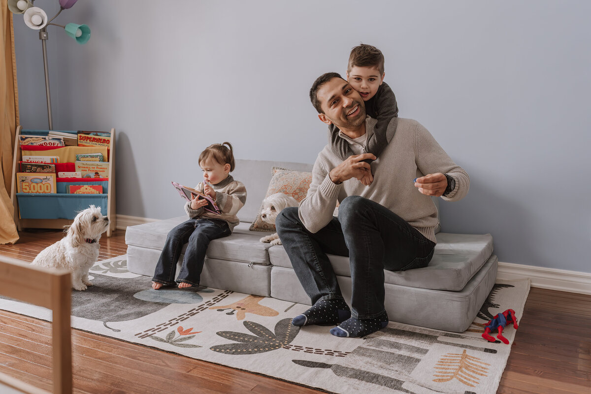 dad playing with children